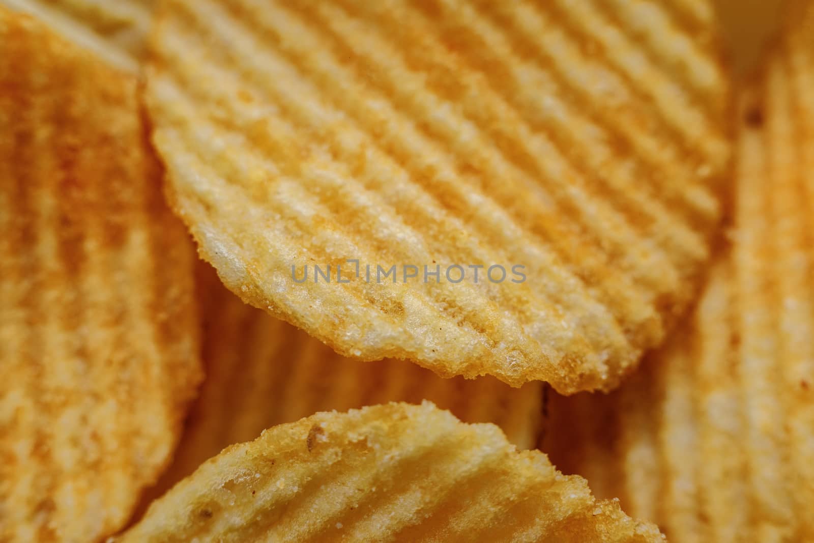 Corrugated Potato Chips. Close-up macro view