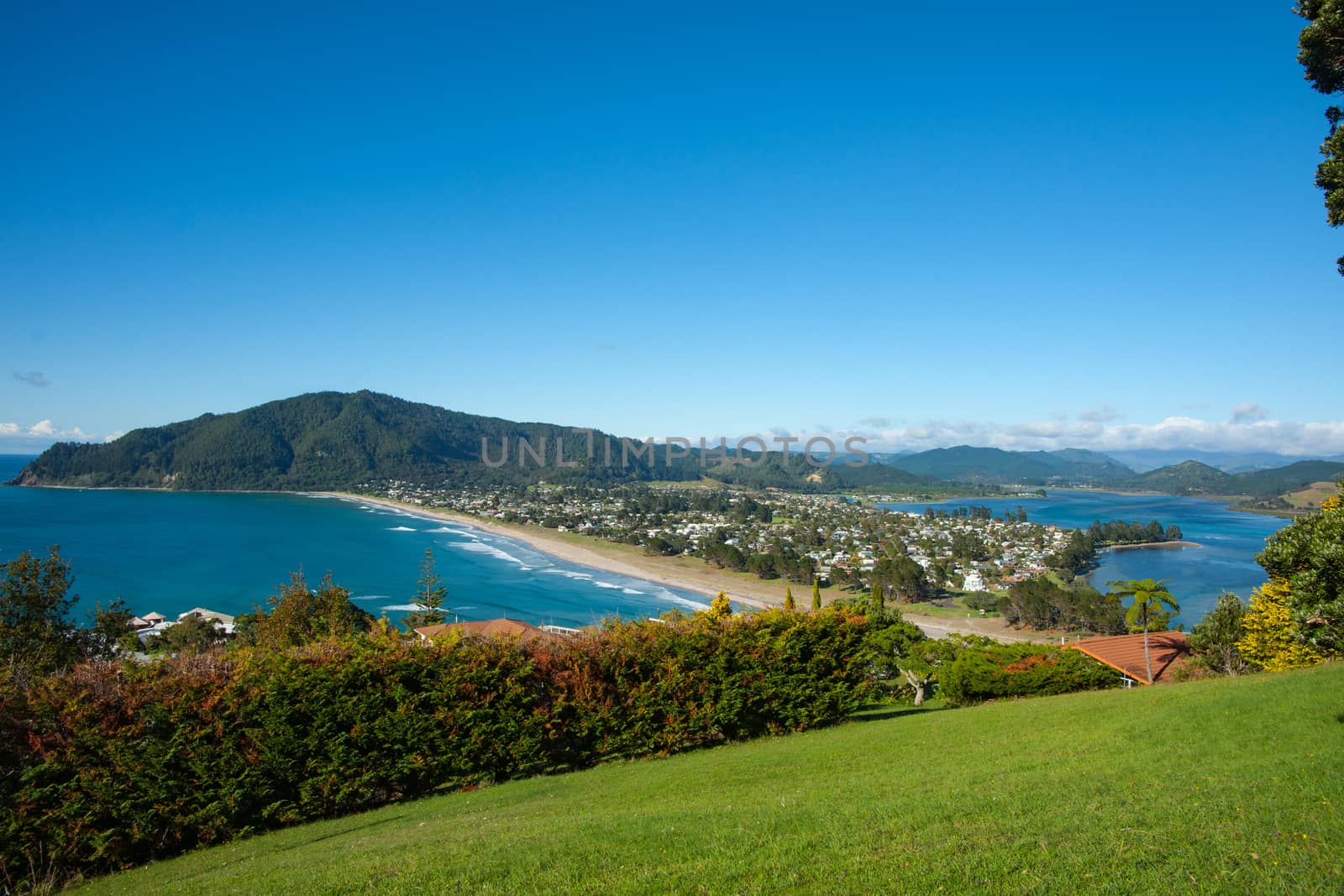 Tairua township and beach on Coromandel Peninsula, New Zealand.