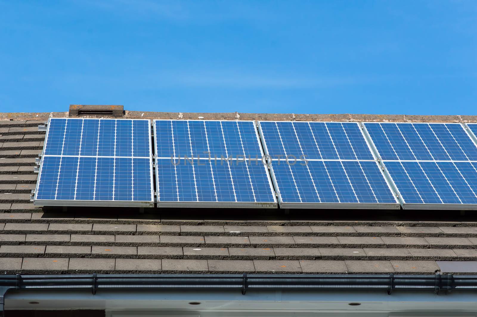 Solar panels on a roof on a sunny day