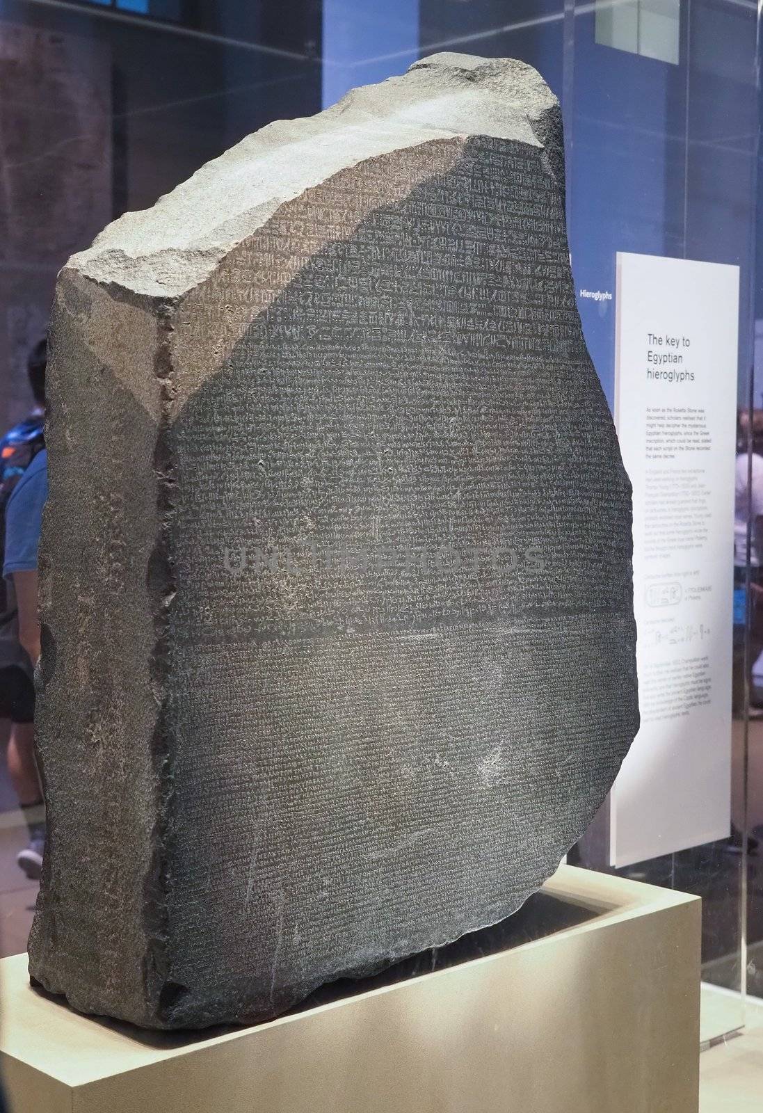 LONDON, UK - CIRCA SEPTEMBER 2019: Rosetta Stone stele at the British Museum with text in Ancient Egyptian hieroglyphic, Demotic scripts and Ancient Greek