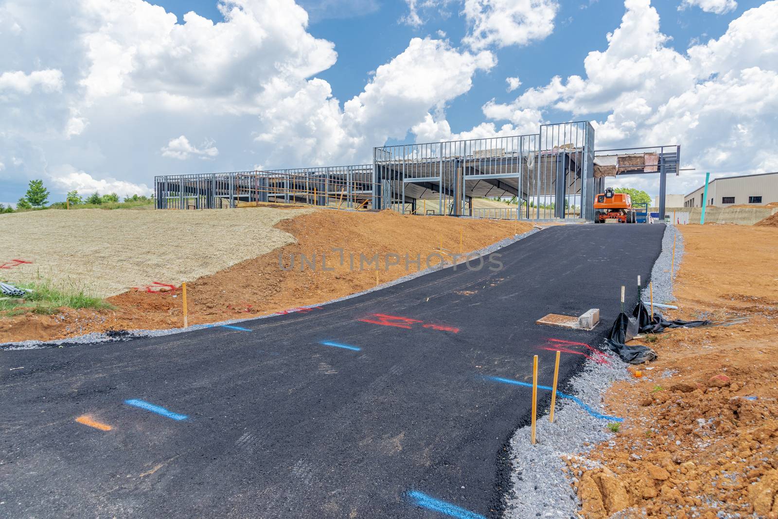 Horizontal shot of a construction site for a new commercial building complex.