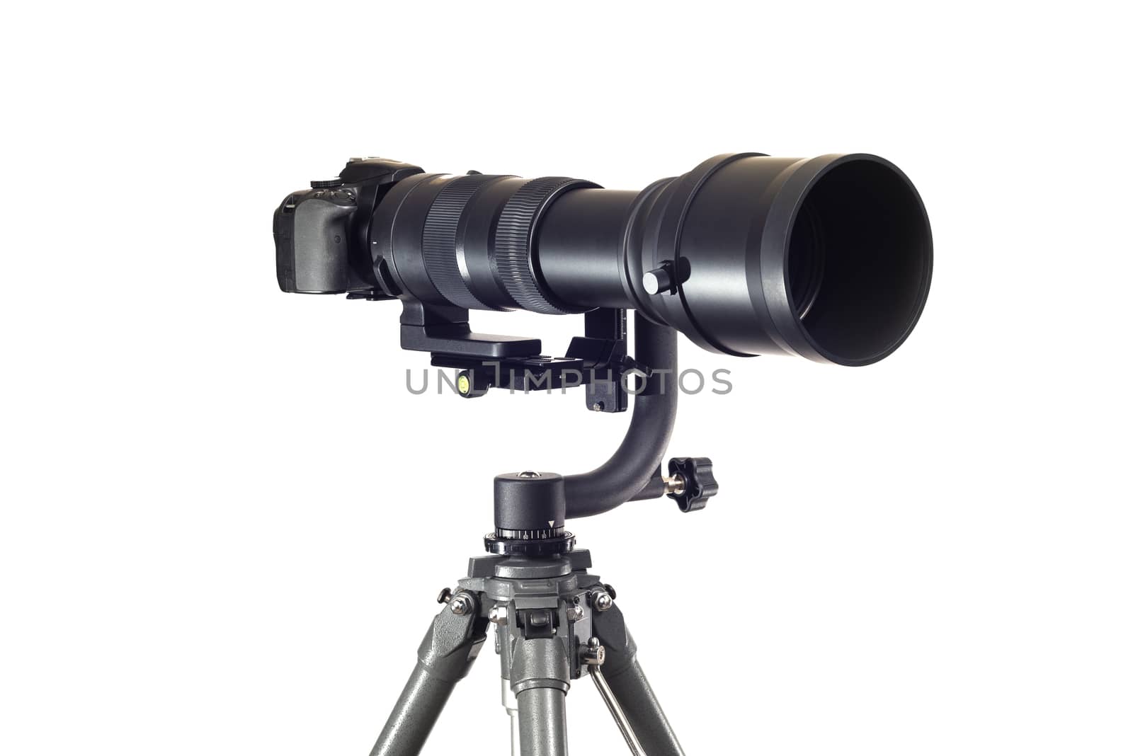 Horizontal shot of of a digital camera on a tripod with a super telephoto lens isolated on white.