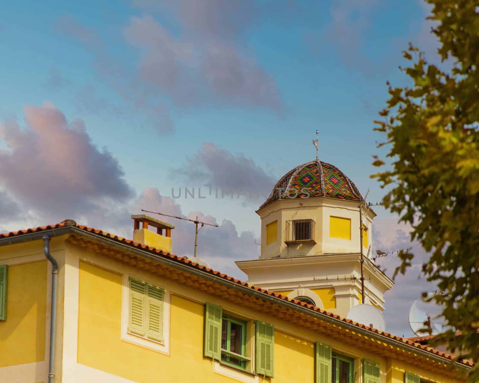 Design of Colorful Rooftiles on Cupola on Yellow Building