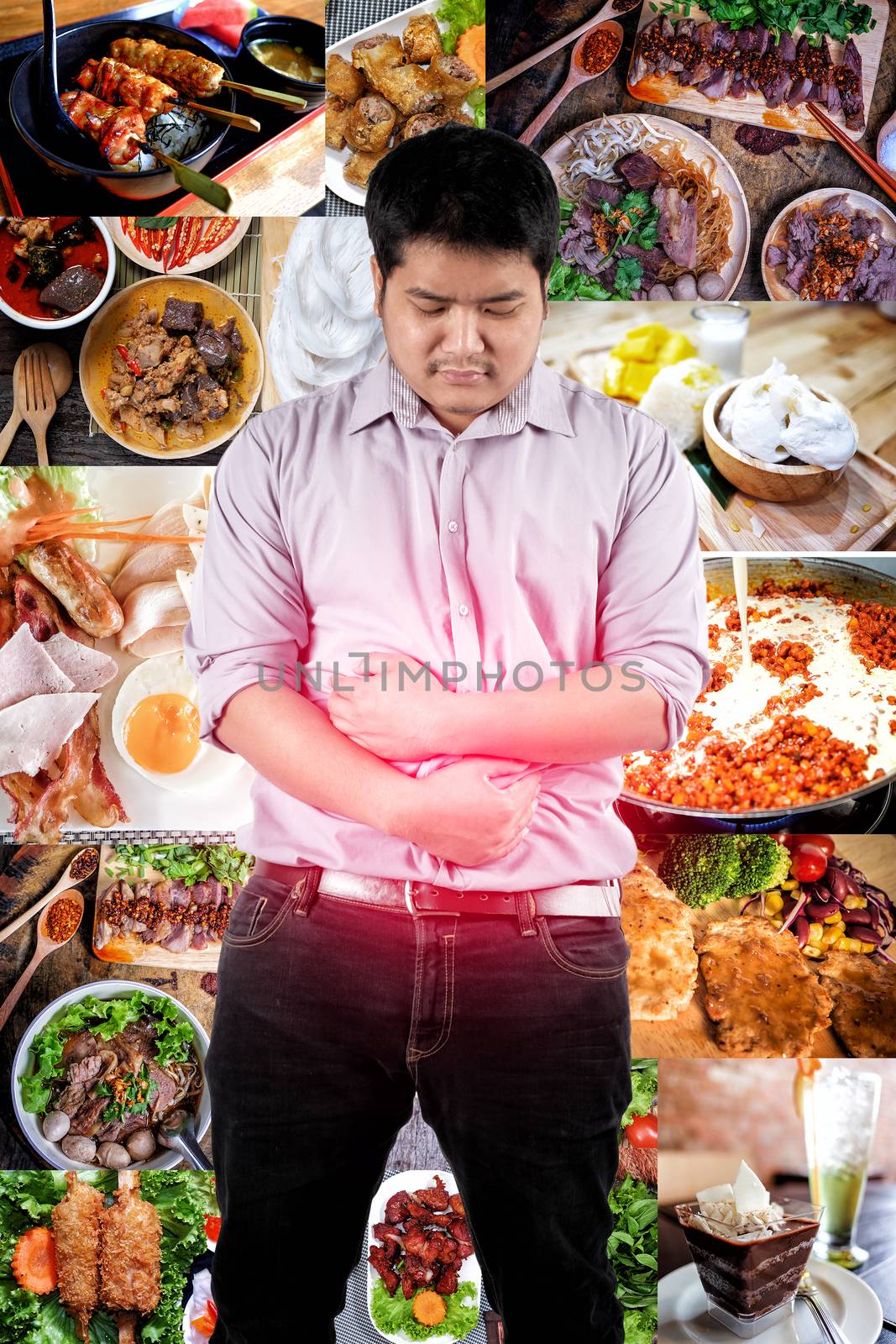 a man suffering from stomach ache because of eating too much food