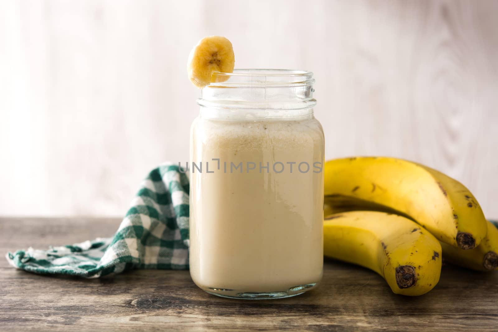 Banana smoothie in jar by chandlervid85