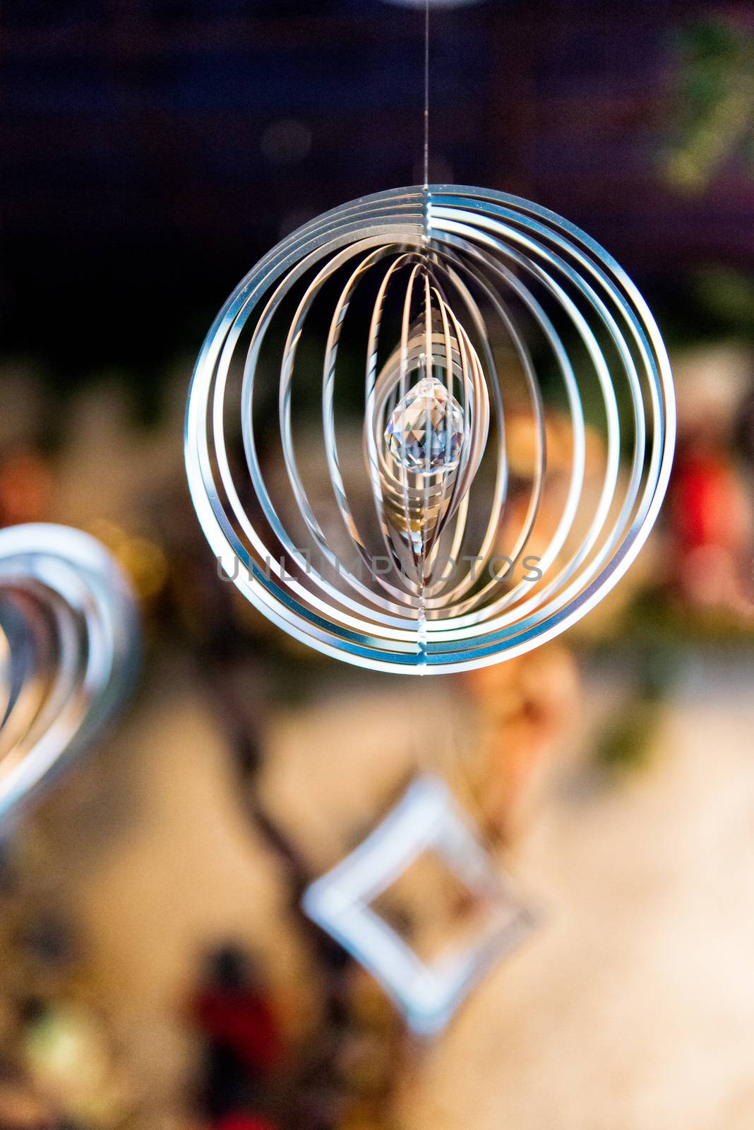 Metal festive decorations on a blurry background, selective focus - image