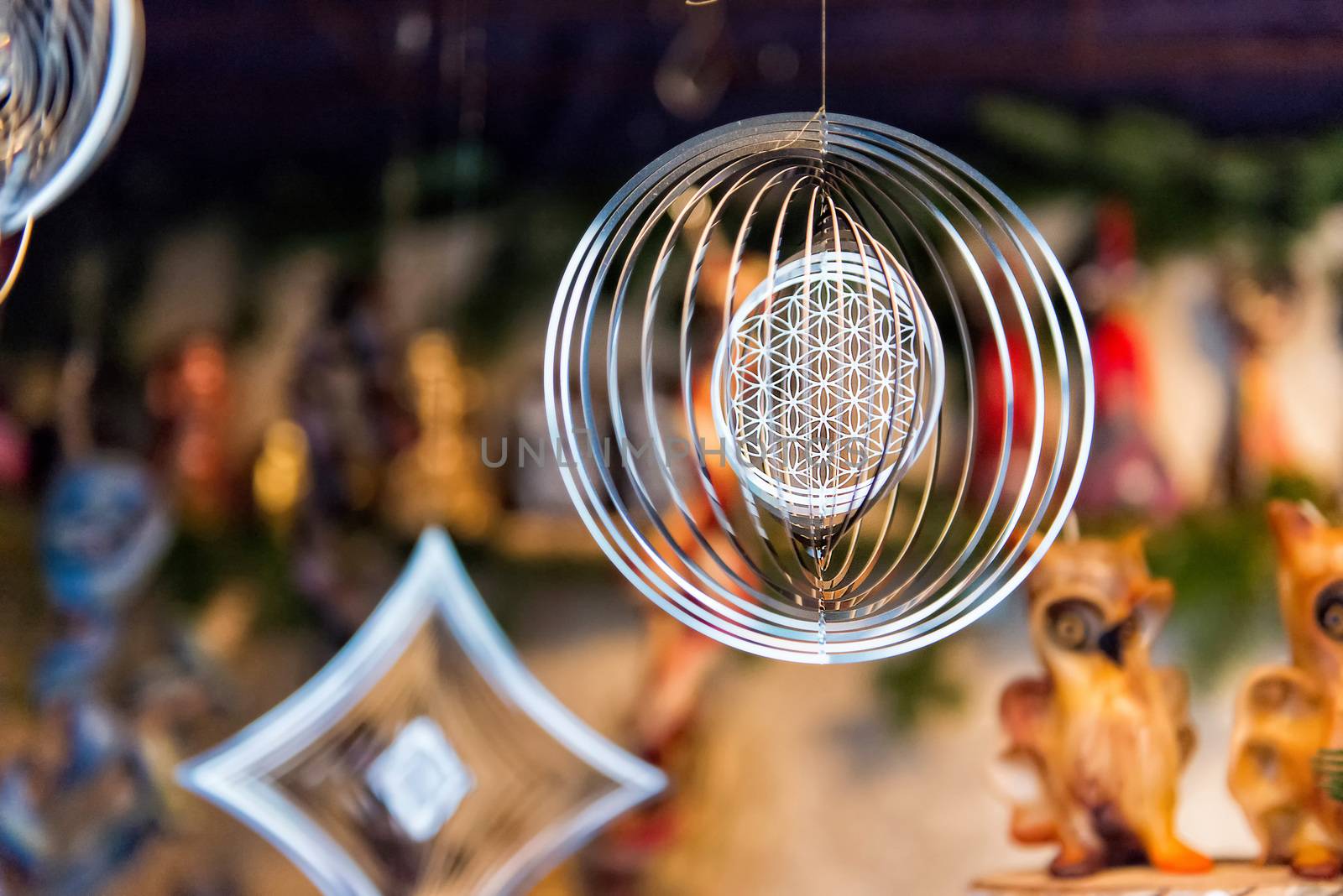 Metal festive decorations on a blurry background, selective focus - image