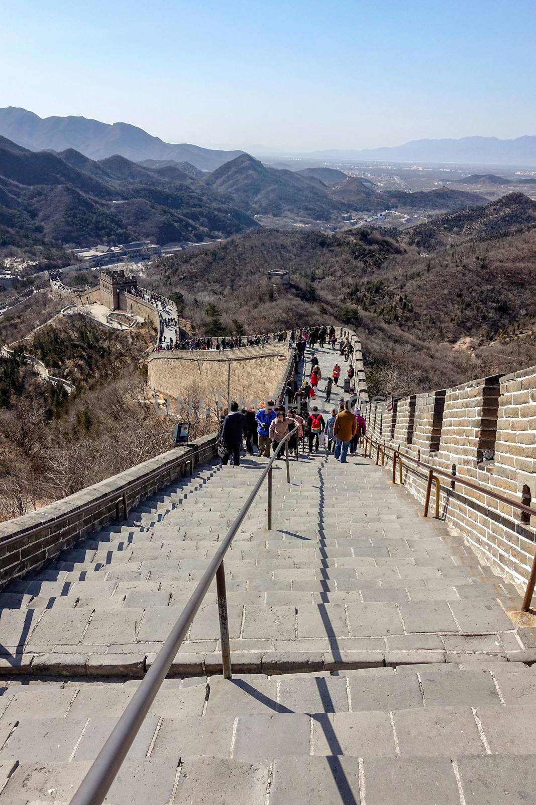 Great Wall of China. Tourists visiting the Great Wall of China near Beijing. by askoldsb