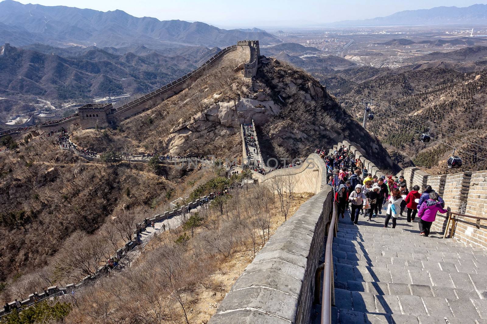 Great Wall of China. Tourists visiting the Great Wall of China near Beijing. by askoldsb