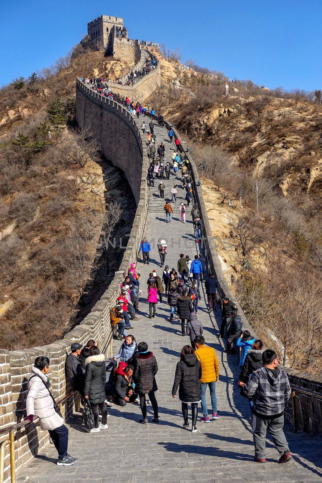 Great Wall of China. Tourists visiting the Great Wall of China near Beijing. by askoldsb