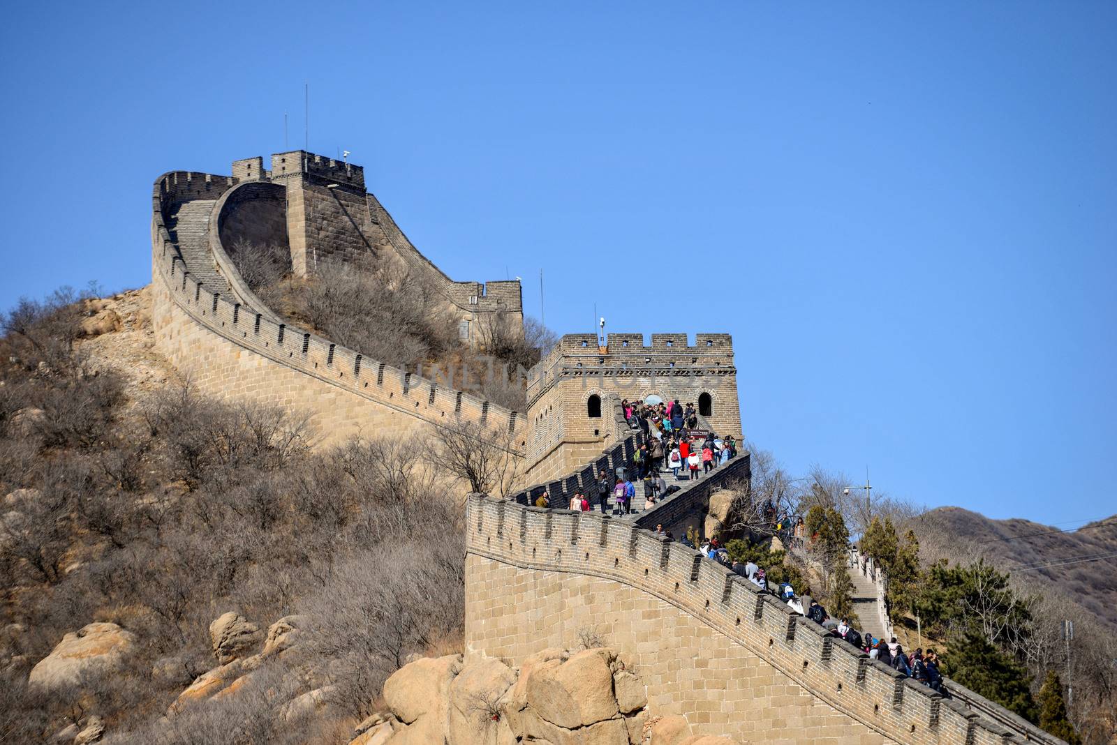 Great Wall of China. Tourists visiting the Great Wall of China near Beijing. by askoldsb