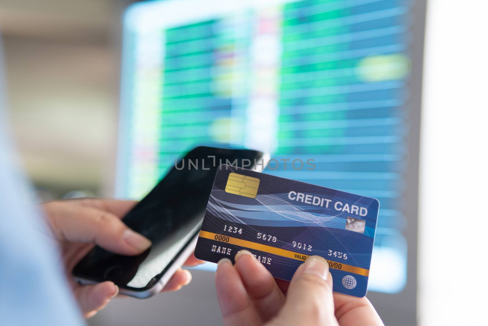 usiness woman hand hold credit card to shopping internet online  by golfmhee
