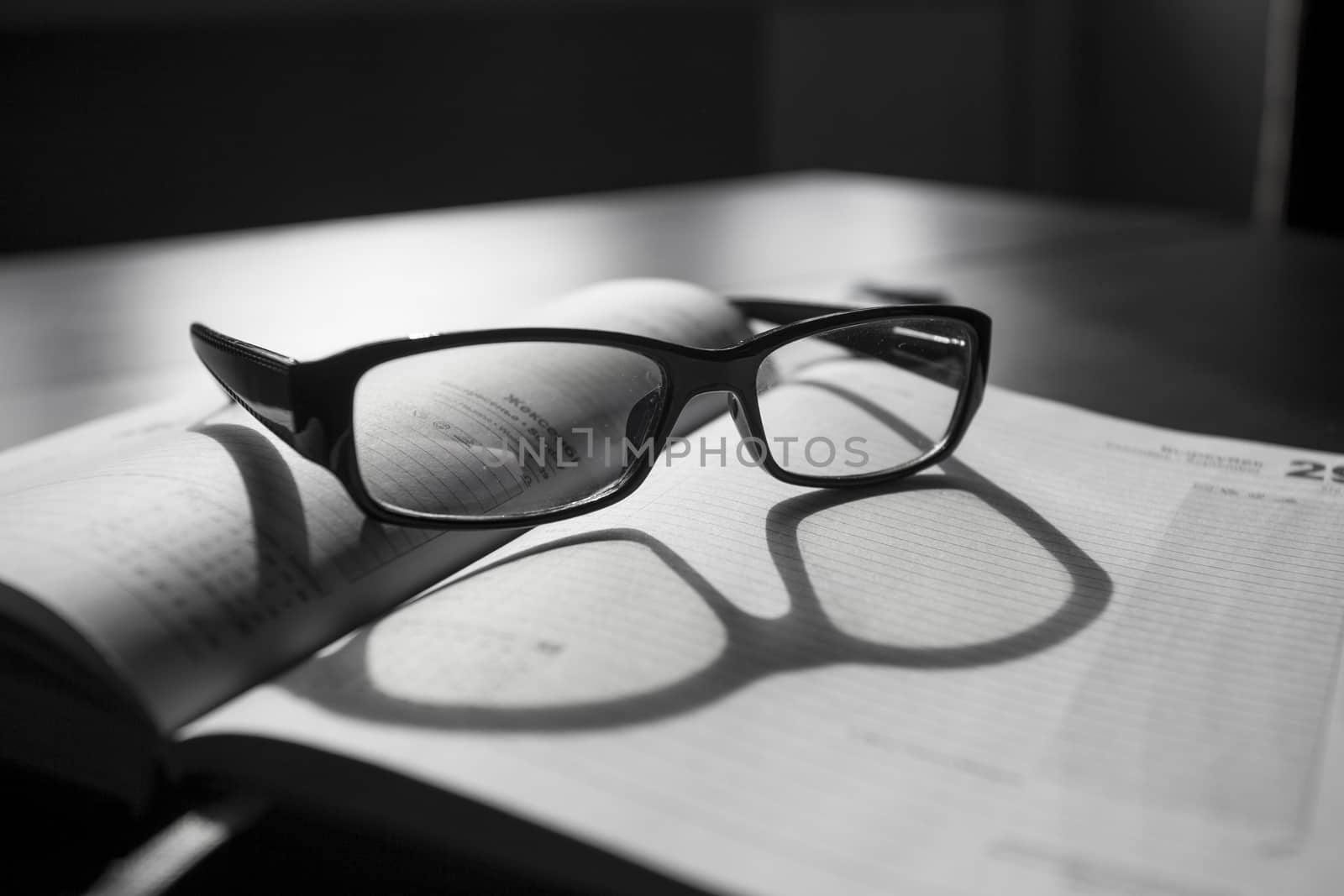 Rest for eyes, glasses on a notebook