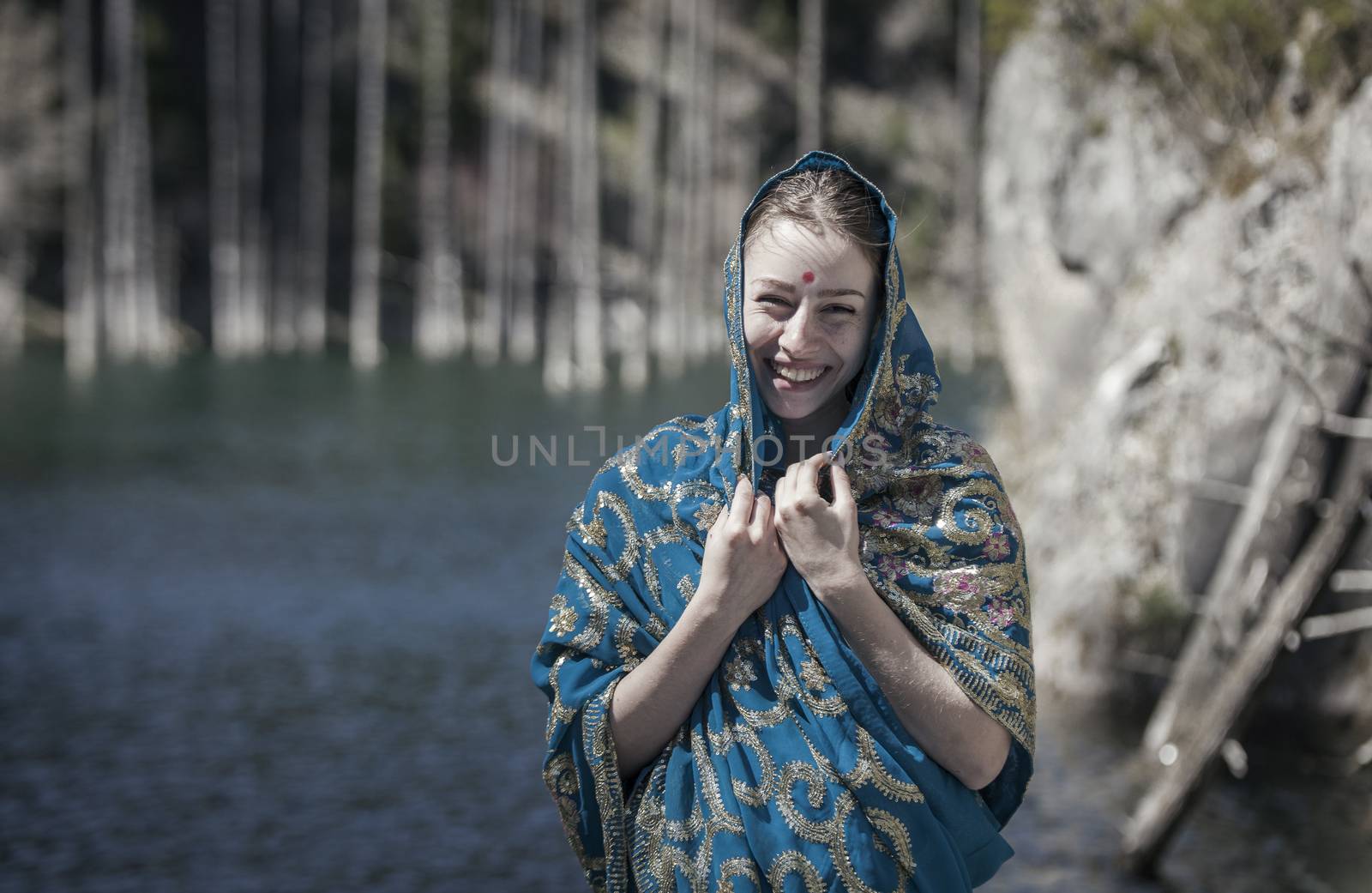 The girl laugh and poses in the Indian sari by snep_photo