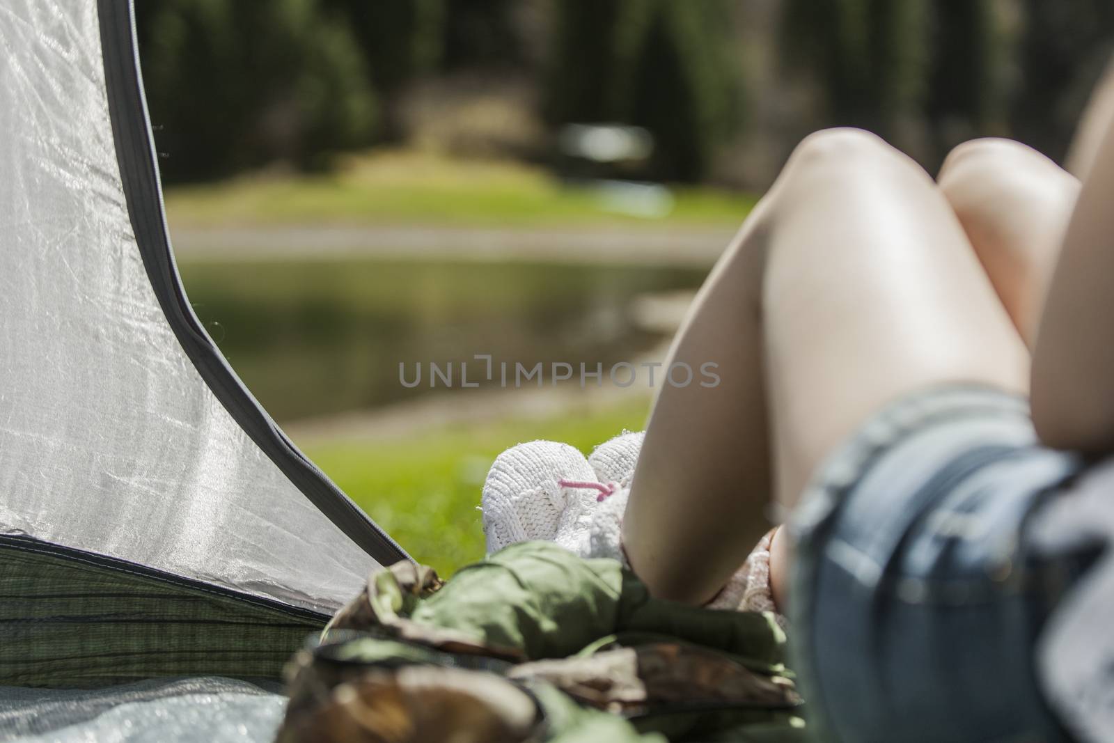 The girl in tent on vacation by snep_photo