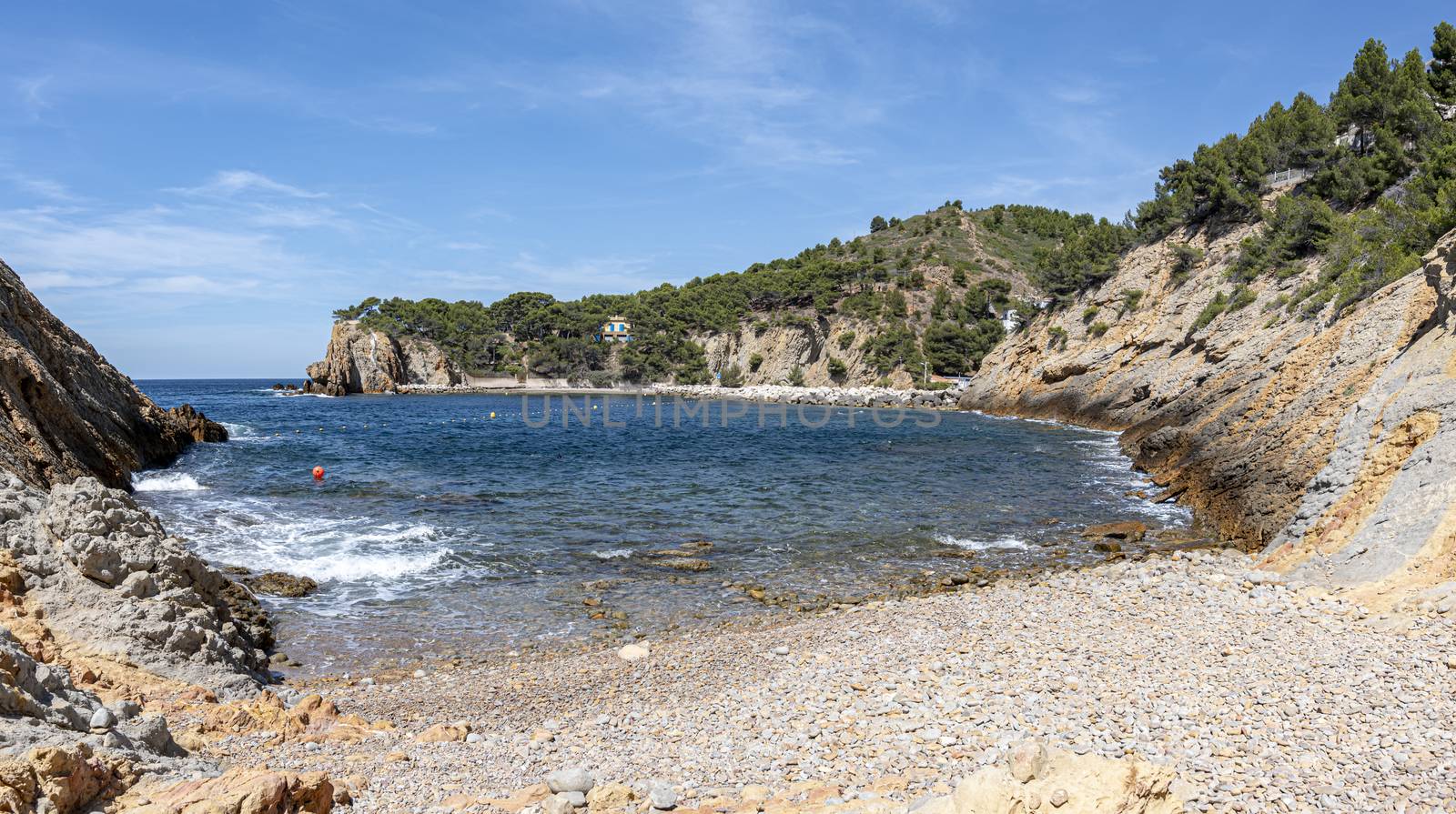 Bay and pebble beach of  the iconic Calanque of Figuieres, creek of Figuieres and Figuières Cove in Méjean, South of France, Europe