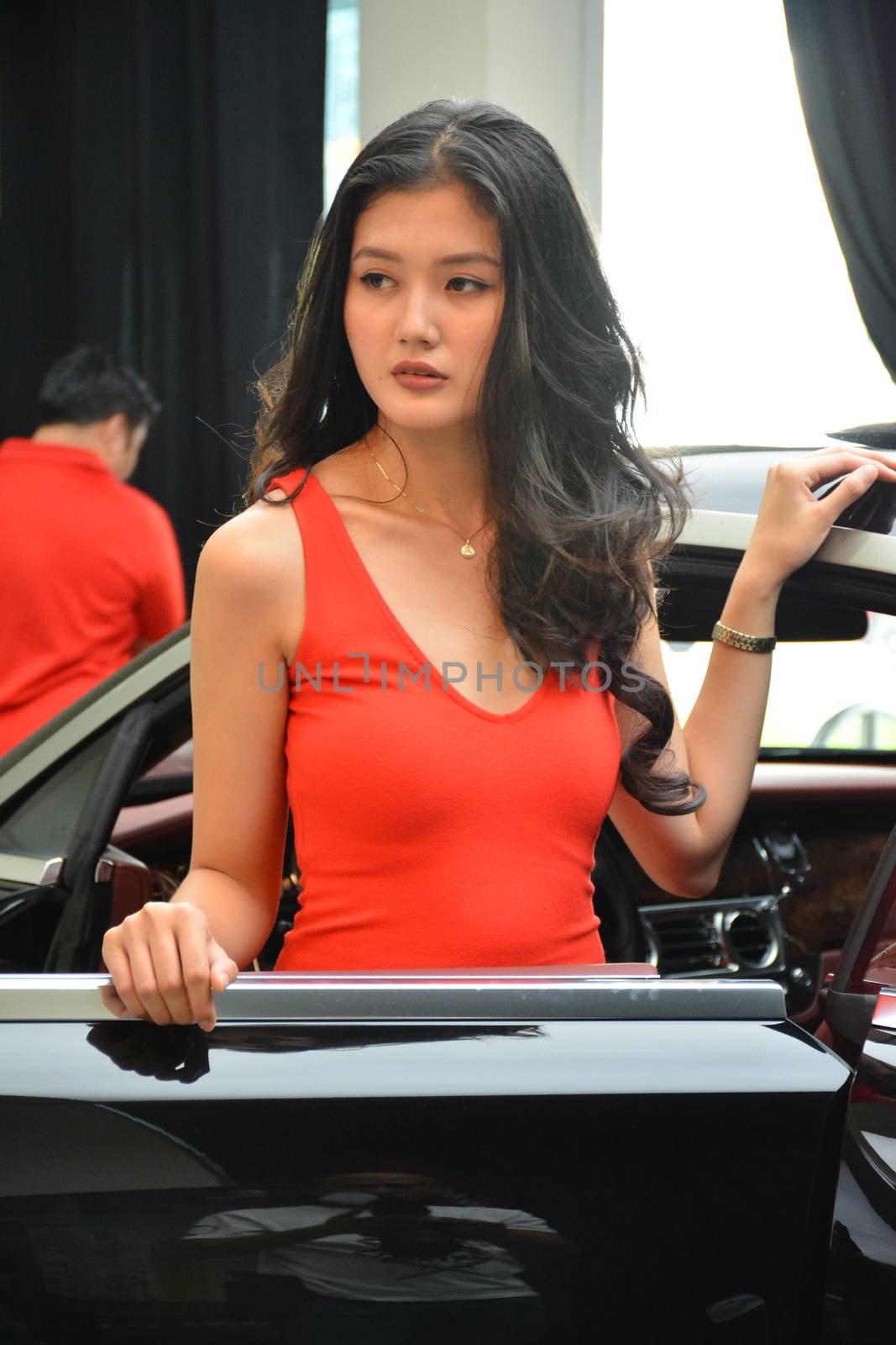 Rolls Royce female model at Rolls Royce car showroom in Bonifaci by imwaltersy