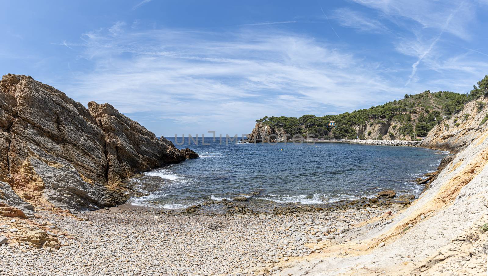 panoramic view of the bay and pebble beach of Calanques of Figuieres, creek of Figuieres and Figuières Cove in Méjean, South of France, Europe