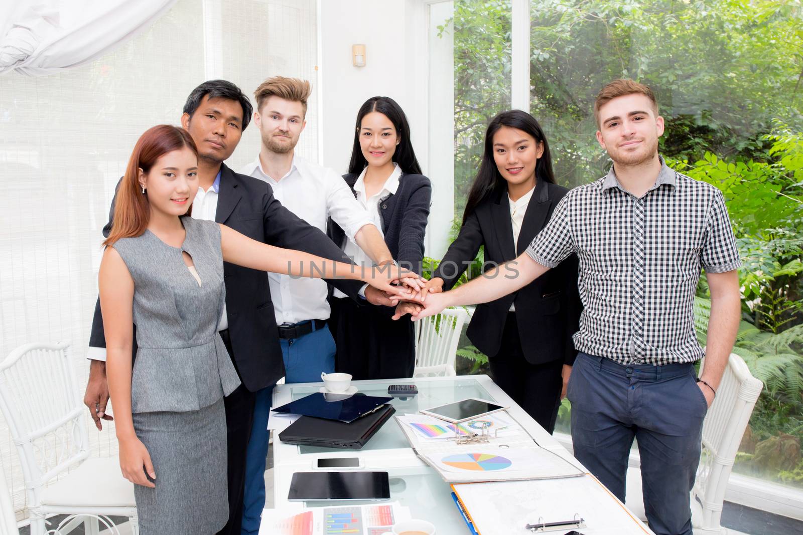 Group of business people join the hand or group teamwork Concept.