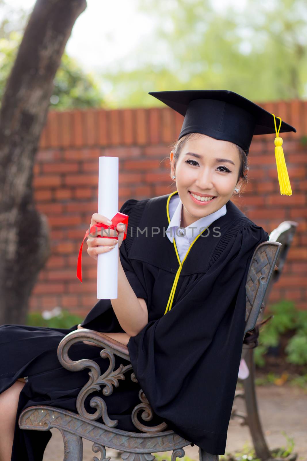 Happy graduated student girl, congratulations - graduate education success - concept education.