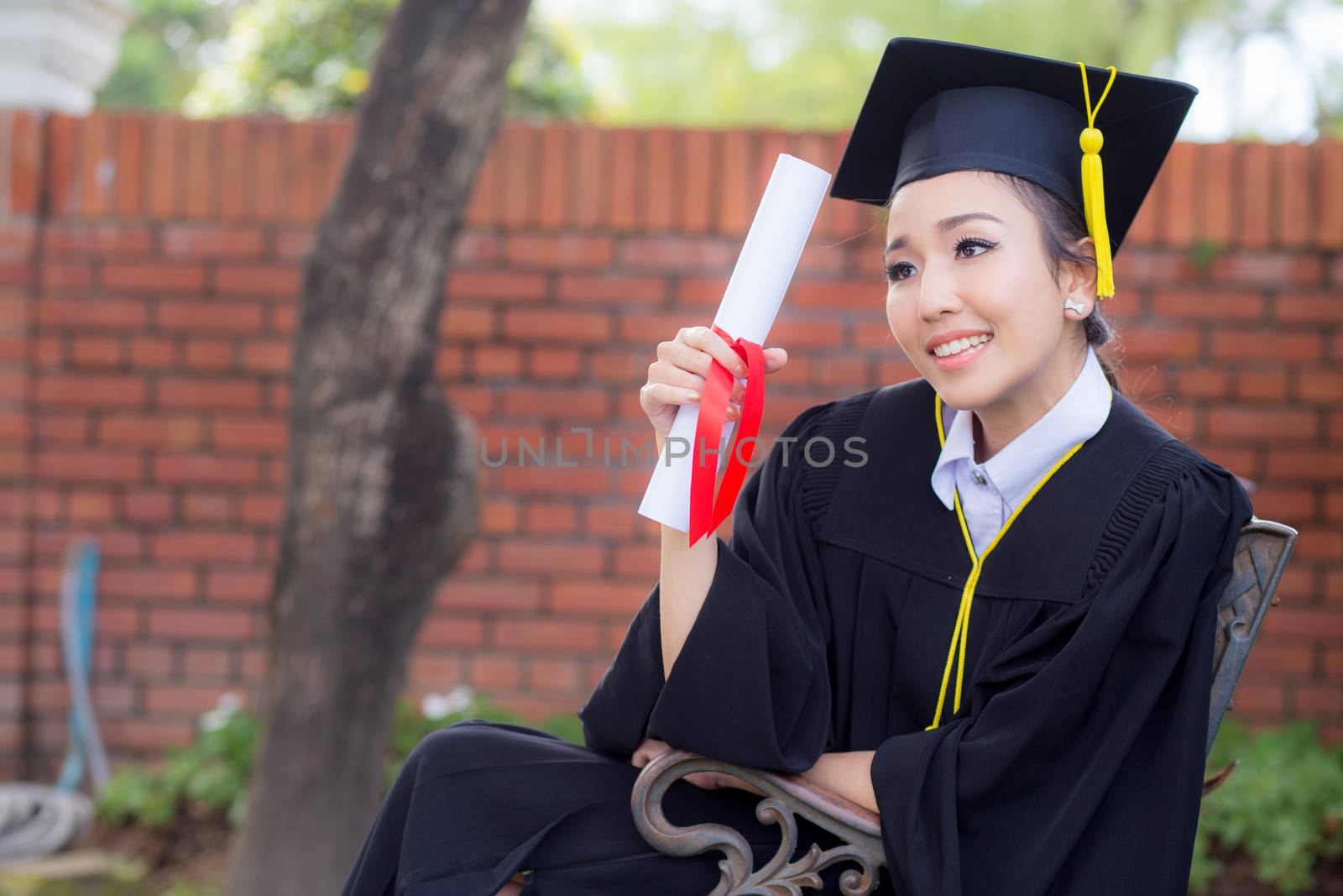 Happy graduated student girl, congratulations - graduate education success - concept education.