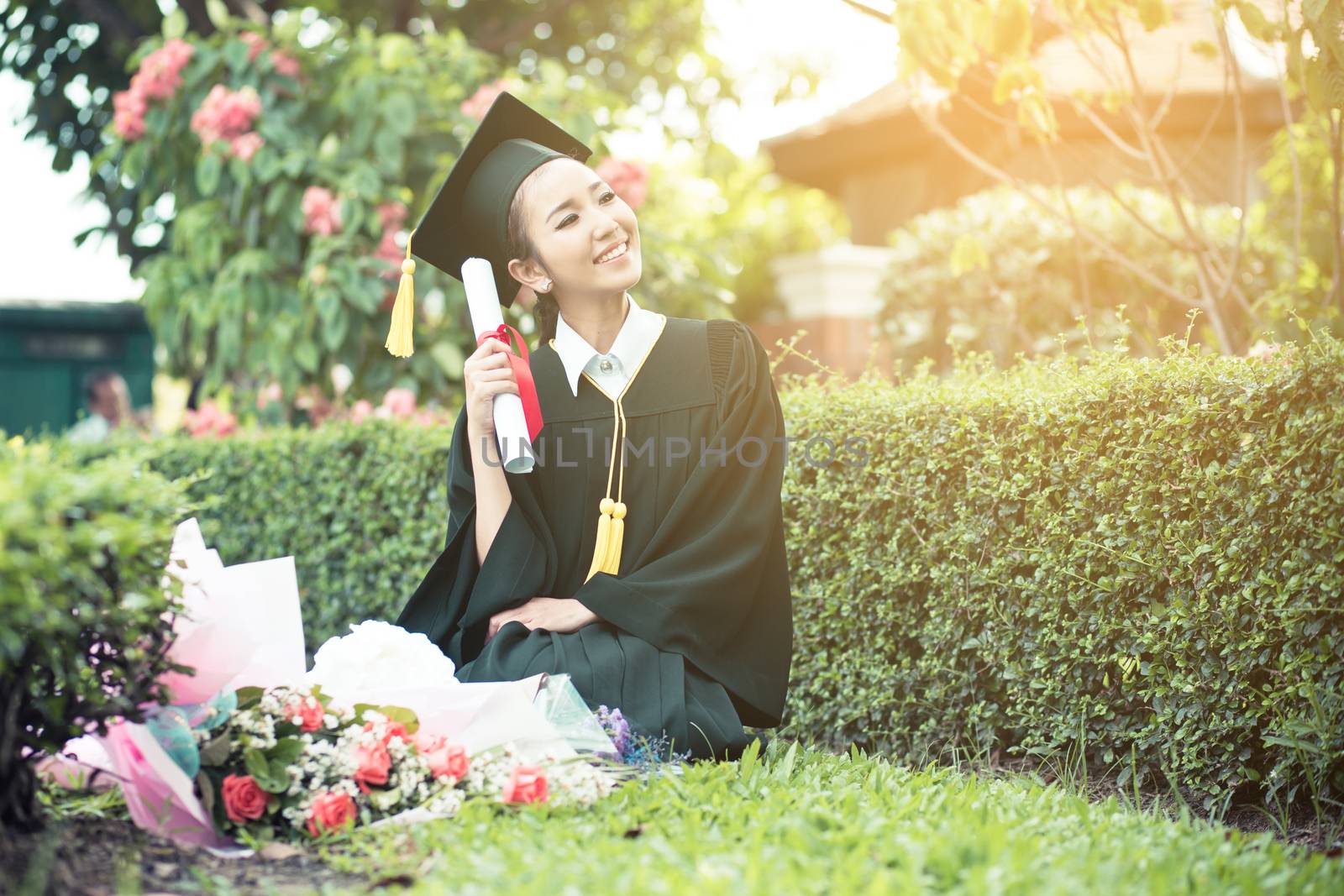 Happy graduated student girl - congratulations of education success.