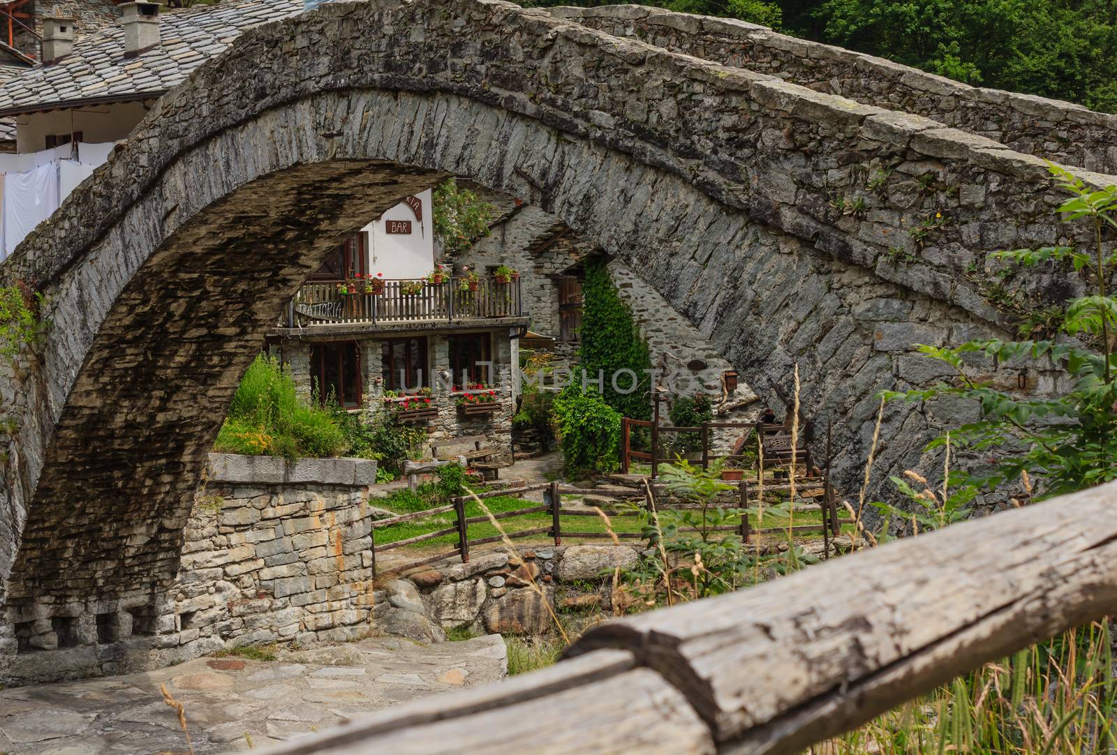 the bridge made of donkey back characteristic of an alpine village in Piedmont, Italy