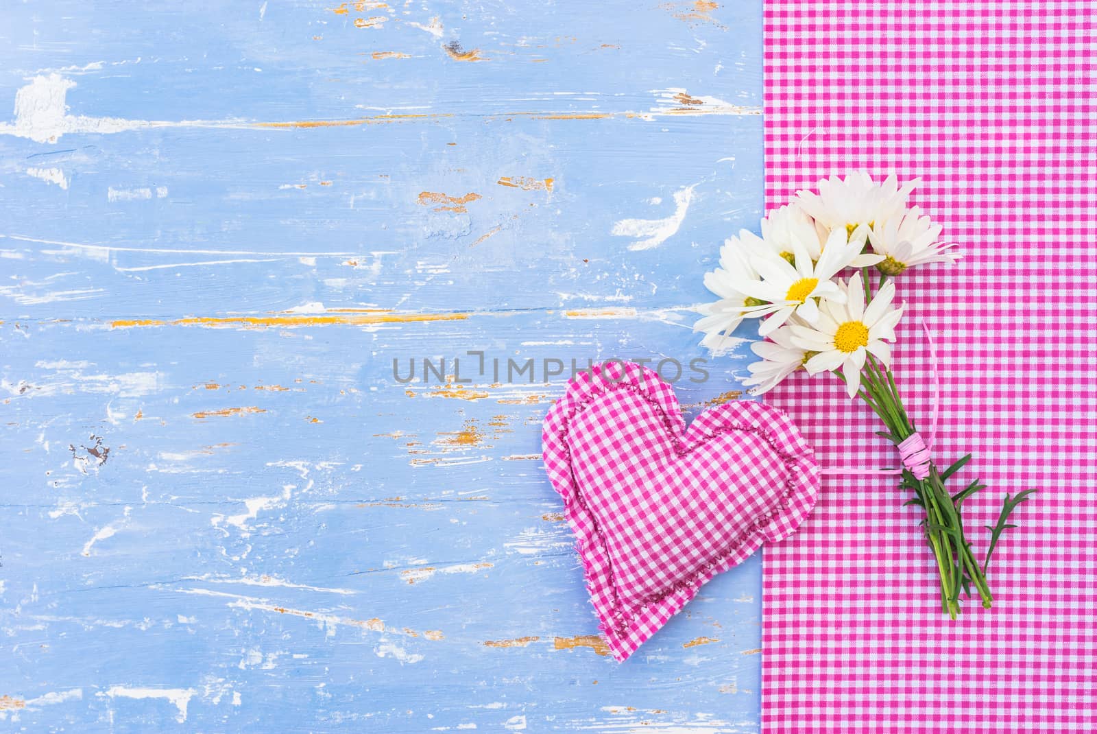 Romantic Valentine's day background with pink heart and bouquet of flowers