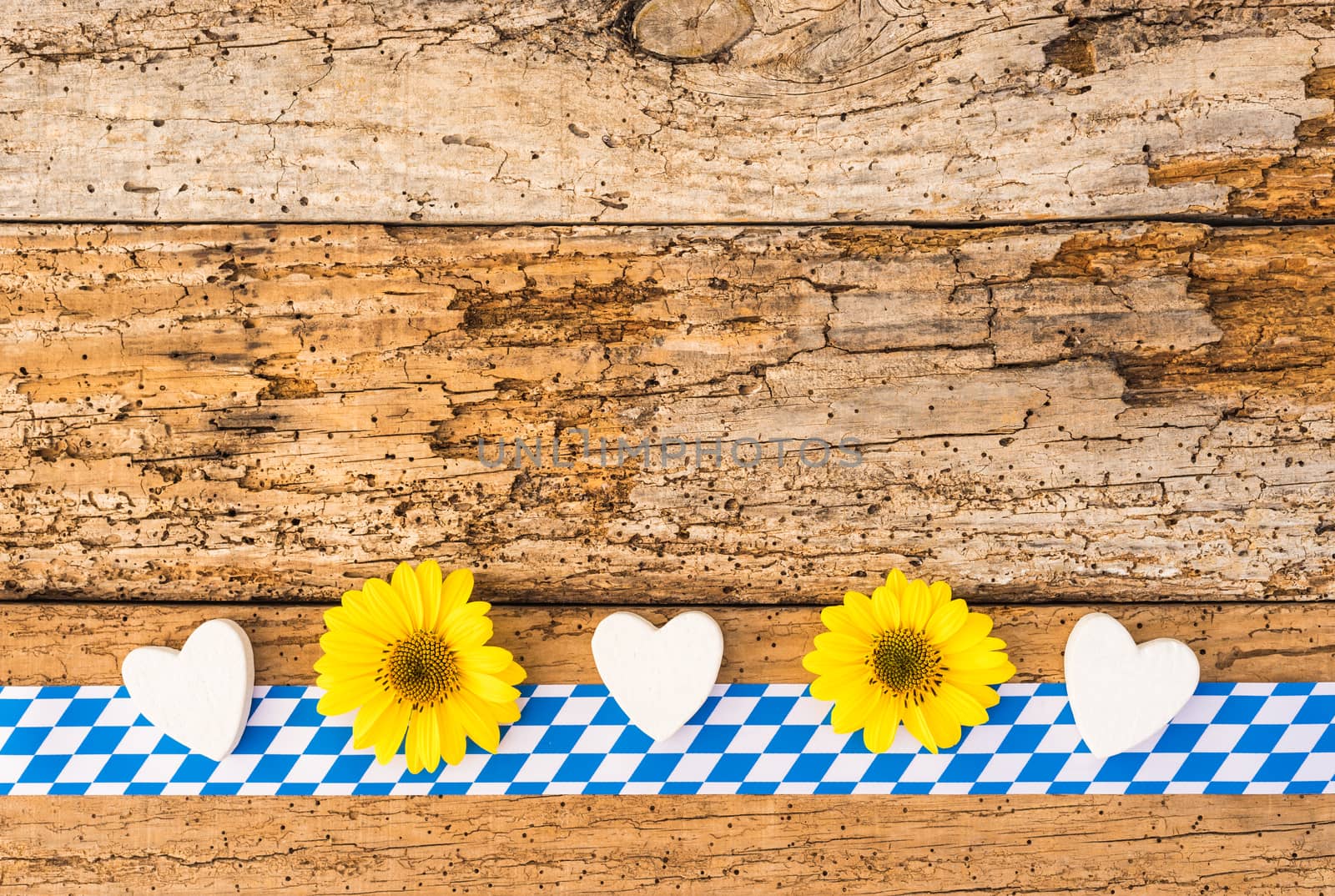Traditional beer festival celebration Oktoberfest background with rustic wood and bavarian pattern
