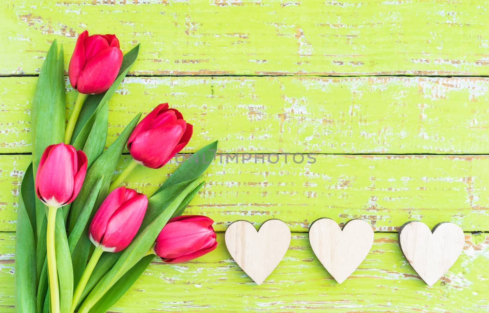 Romantic Valentines day background with red flowers and hearts