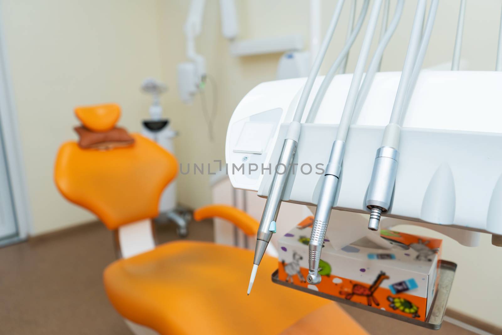 Interior stylish modern dentist office in orange style