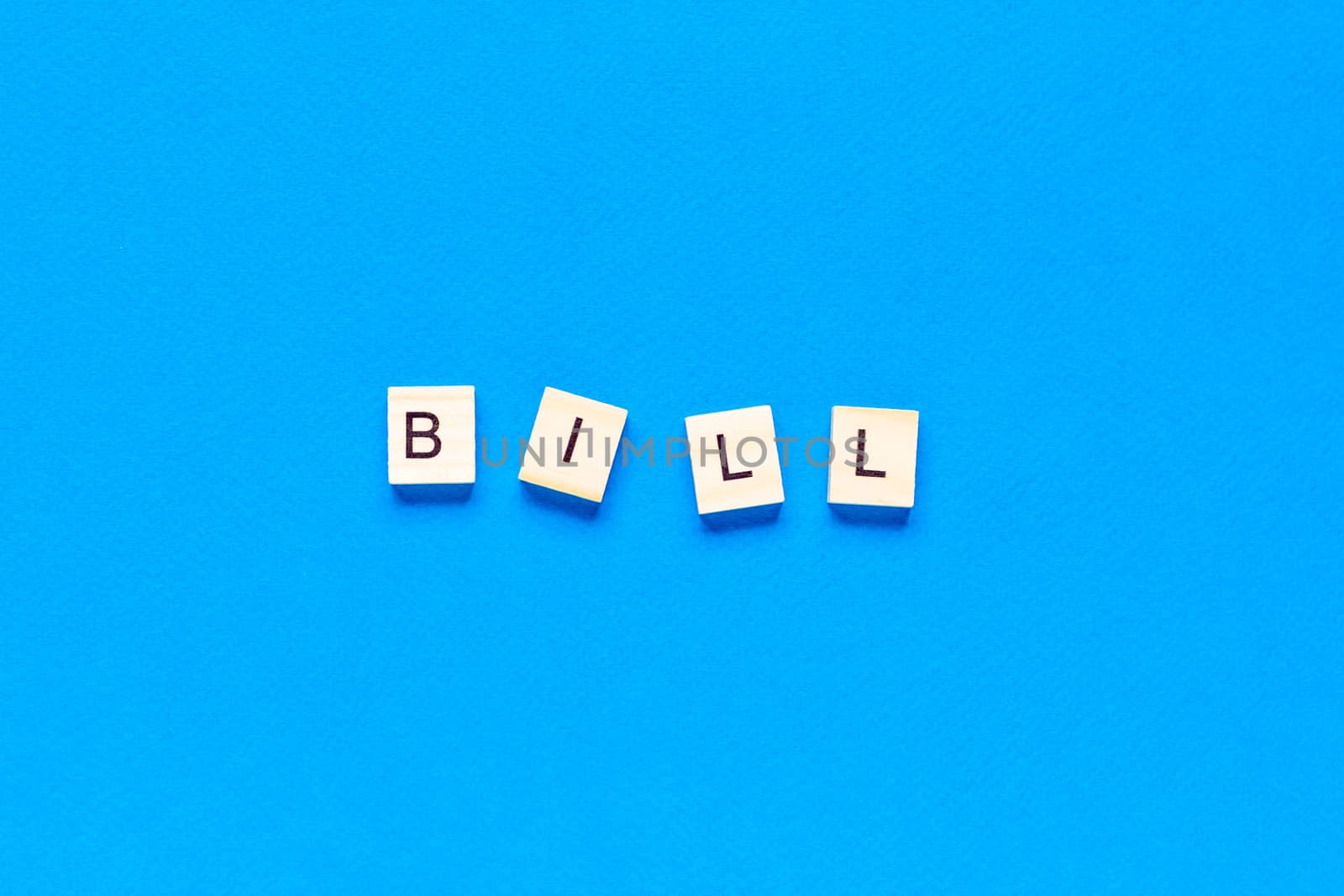 bill in wooden letters on a blue background, flat layout, top view, banner by Pirlik