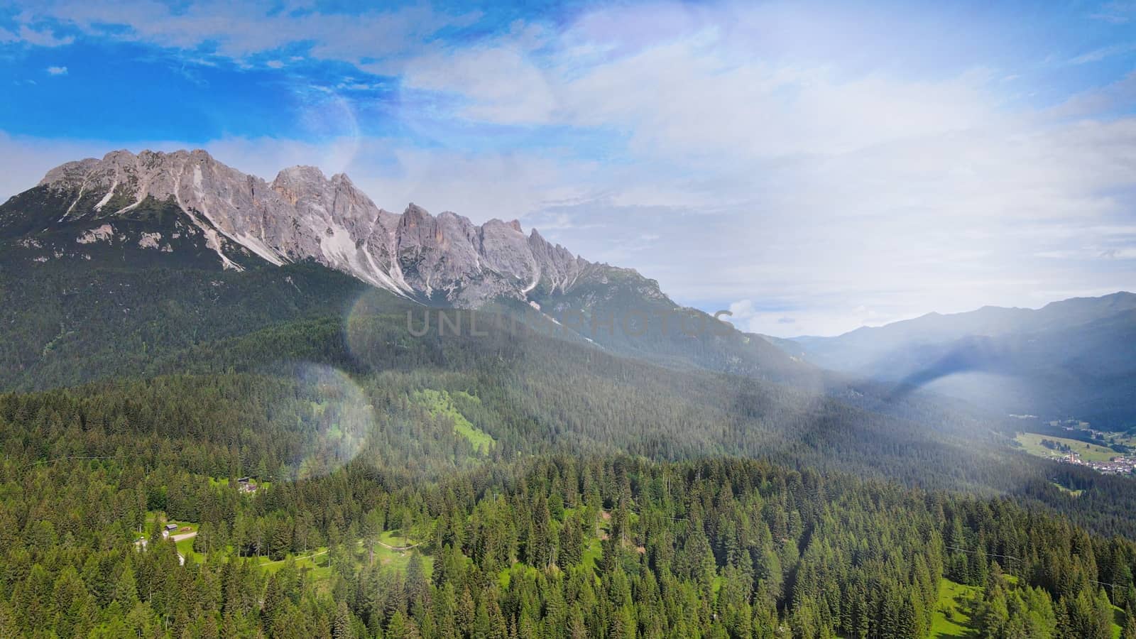 Alpin landscape with beautiful mountains in summertime, view from drone.