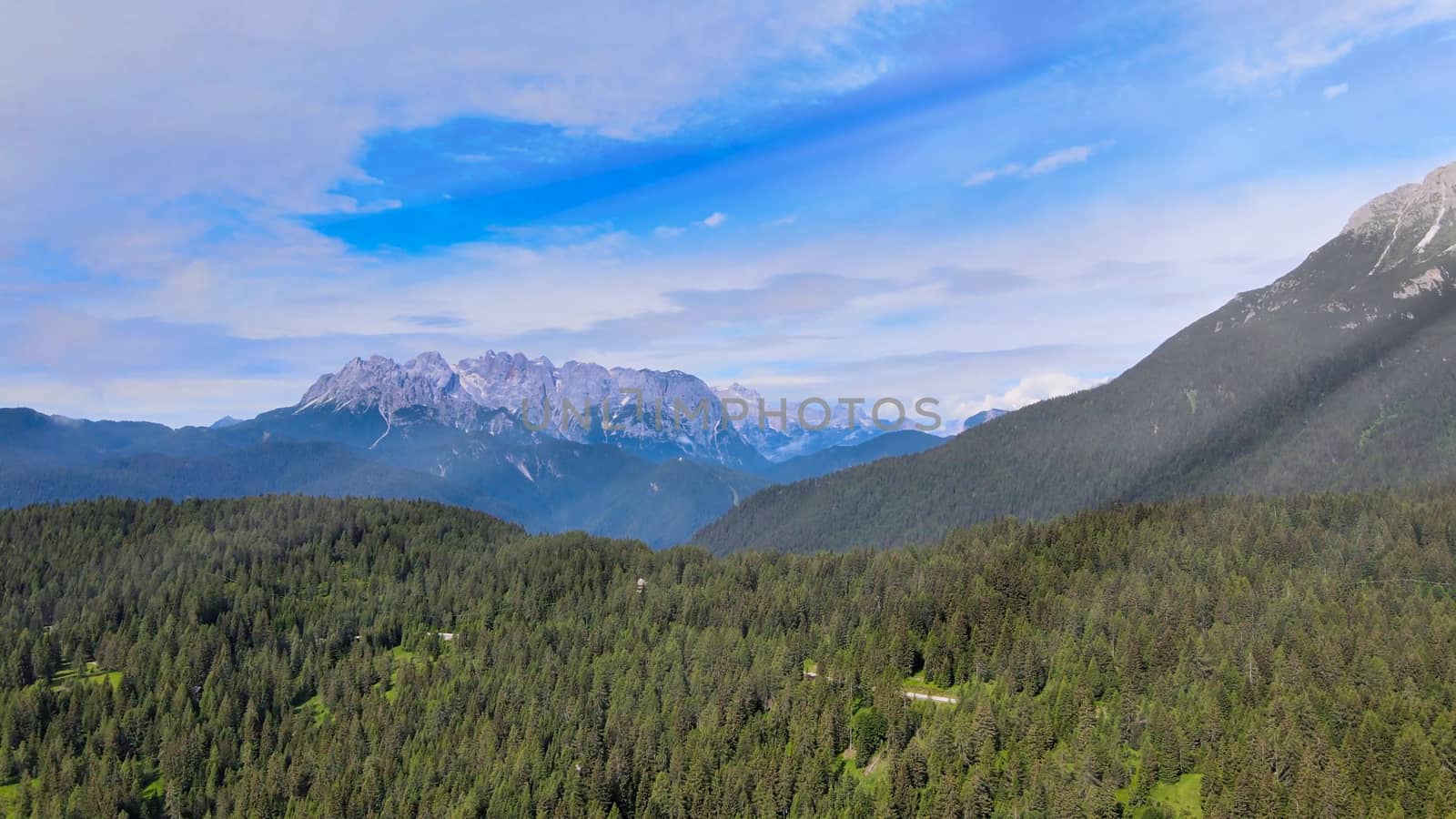 Alpin landscape with beautiful mountains in summertime, view from drone.