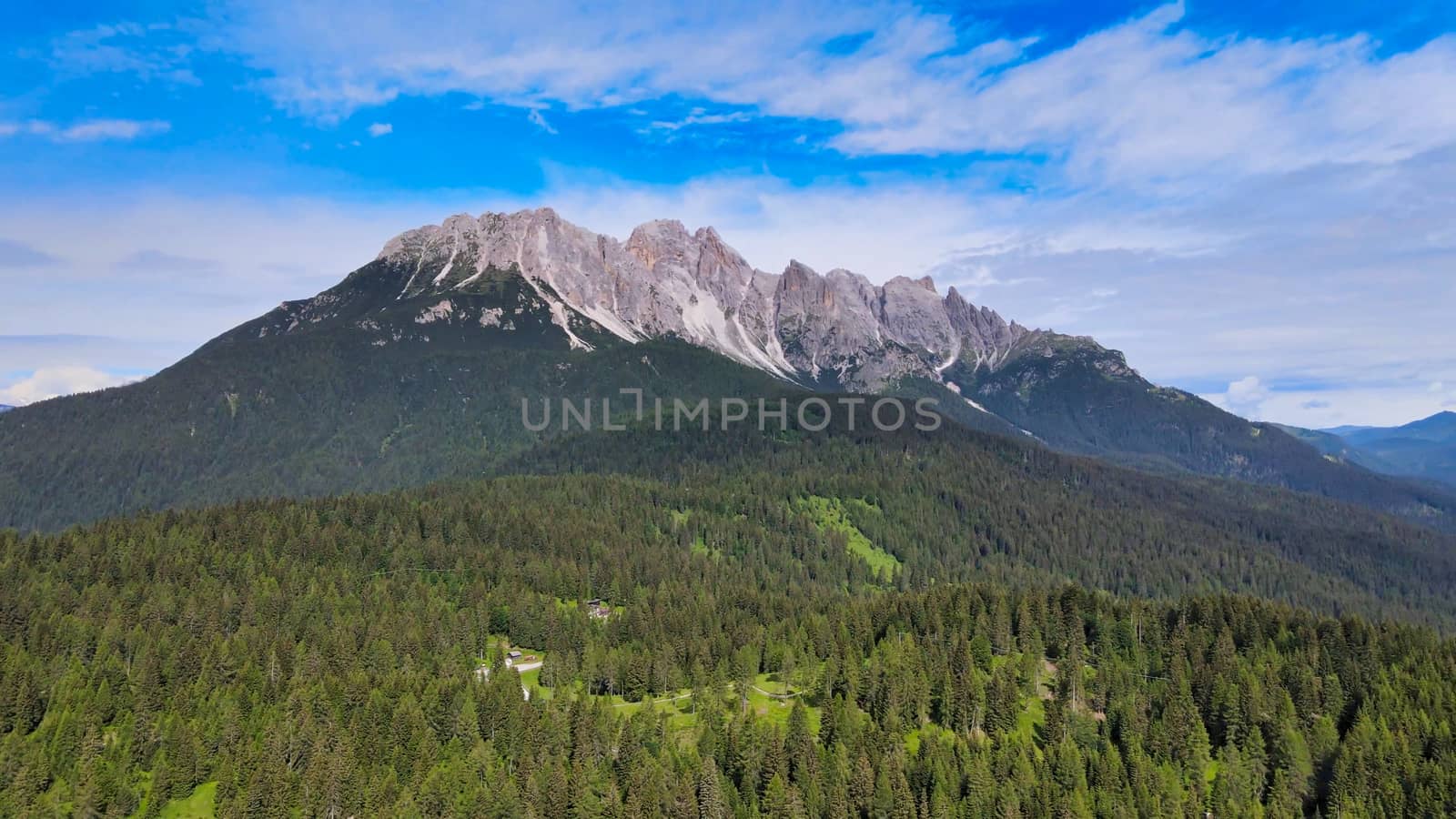 Alpin landscape with beautiful mountains in summertime, view from drone.