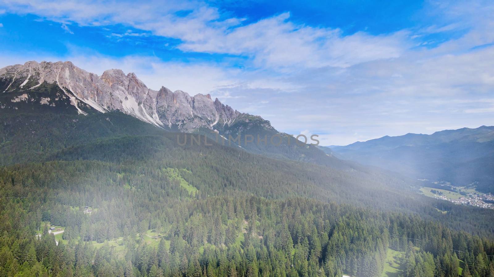 Alpin landscape with beautiful mountains in summertime, view from drone.