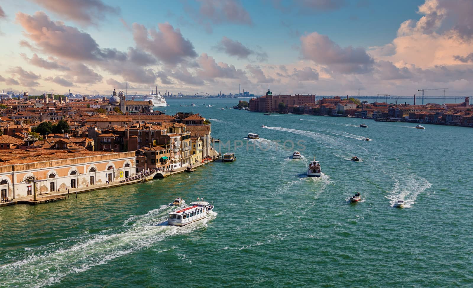 Ferries and Water Taxis in Venice Canal by dbvirago