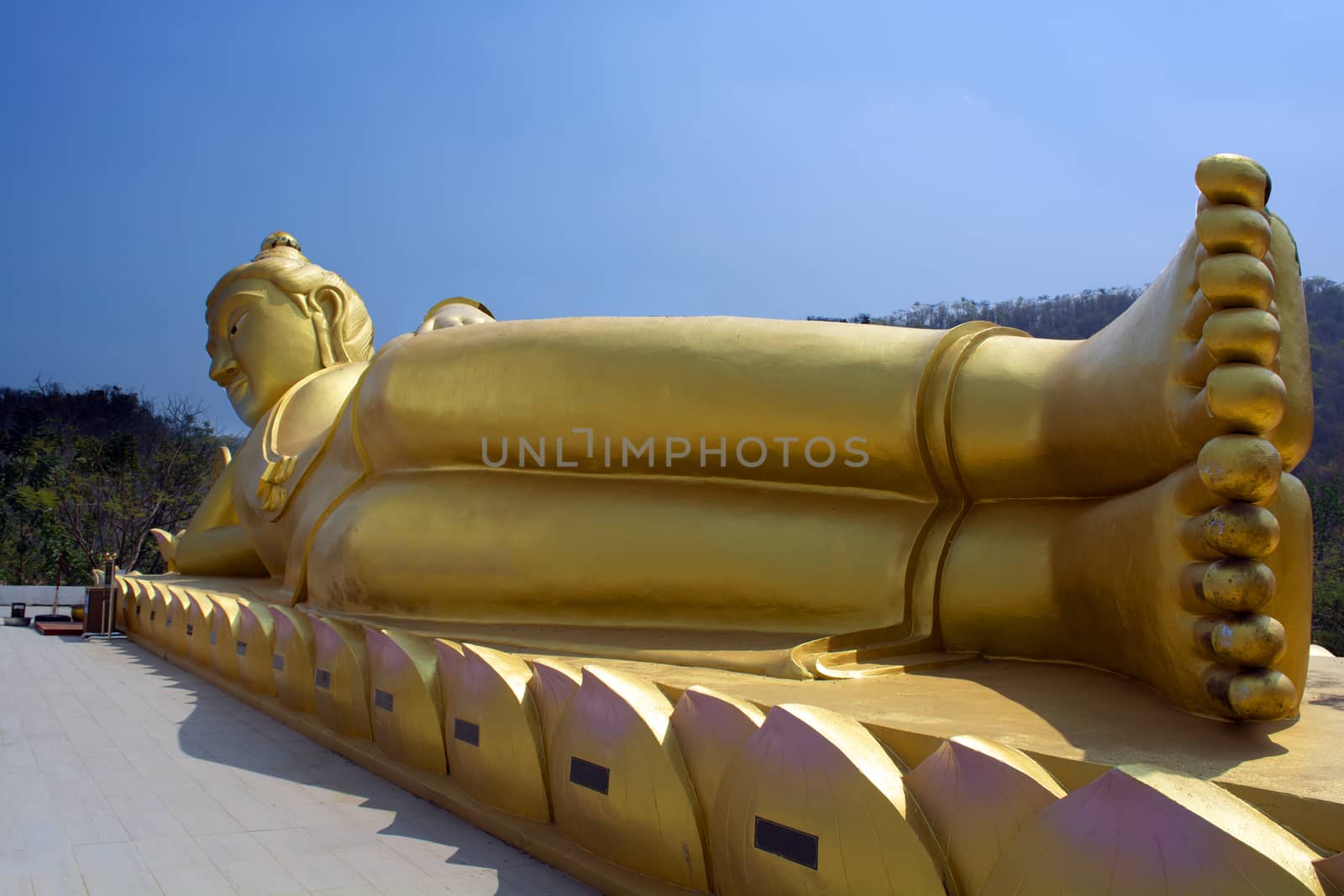 Reclining Buddha is another form of Buddhist. by pandpstock_002