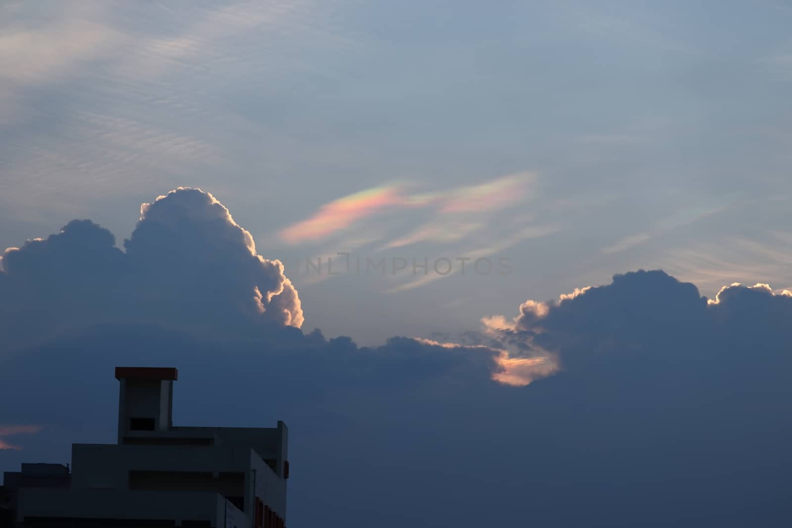 At sunset, the cloud appears in seven colors