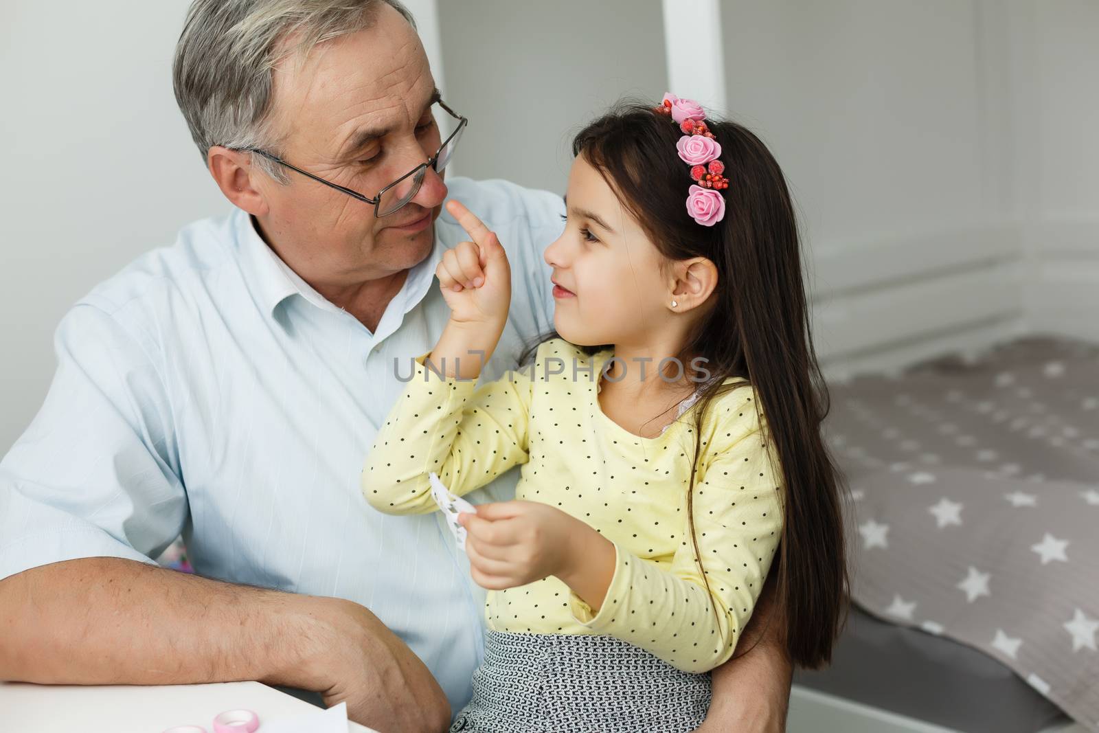 grandfather and granddaughter do her homework