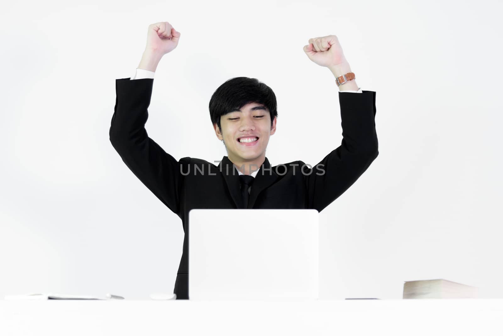 Asian manager businessman sitting at desk and working, isolated on white background.