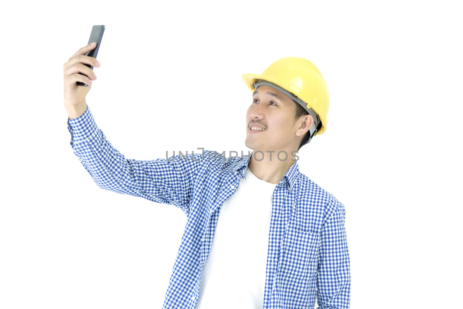 Business man engineer employee with blue scott shirt isolated has selfie on white background.