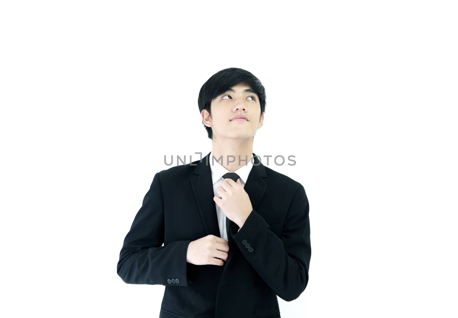 Asia businessman with black suit and black necktie isolated on w by animagesdesign