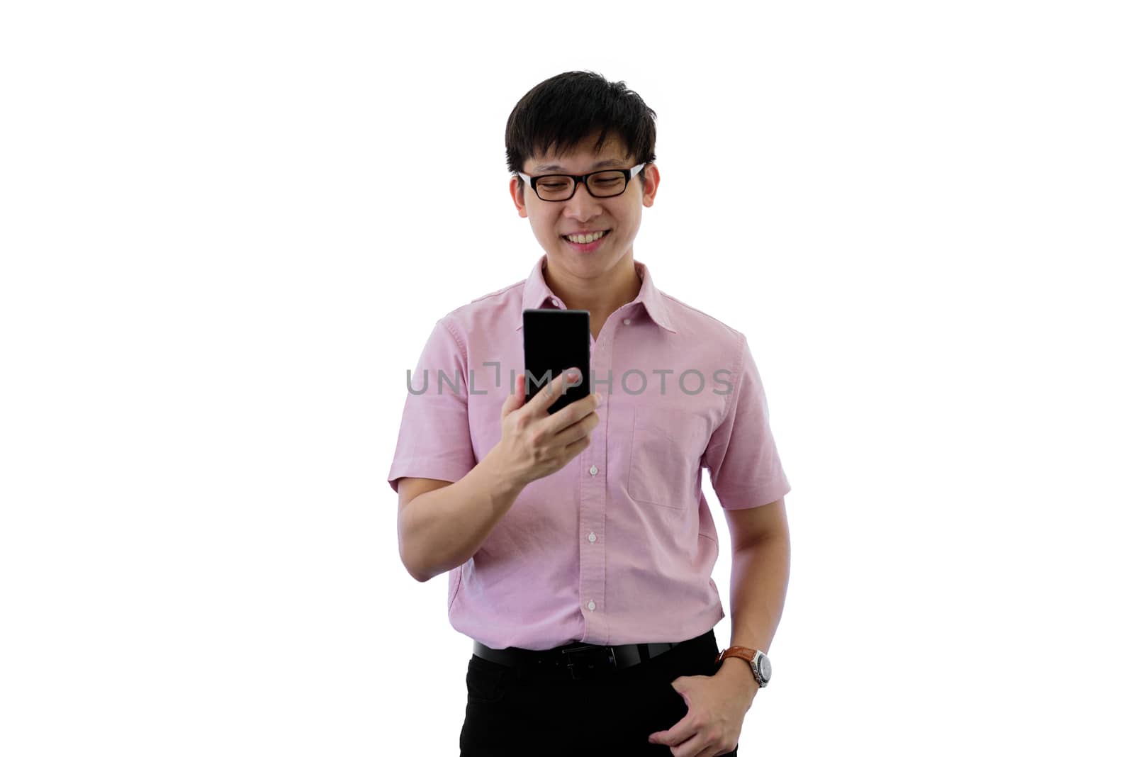 Asian young businessman has standing and playing phone with happ by animagesdesign