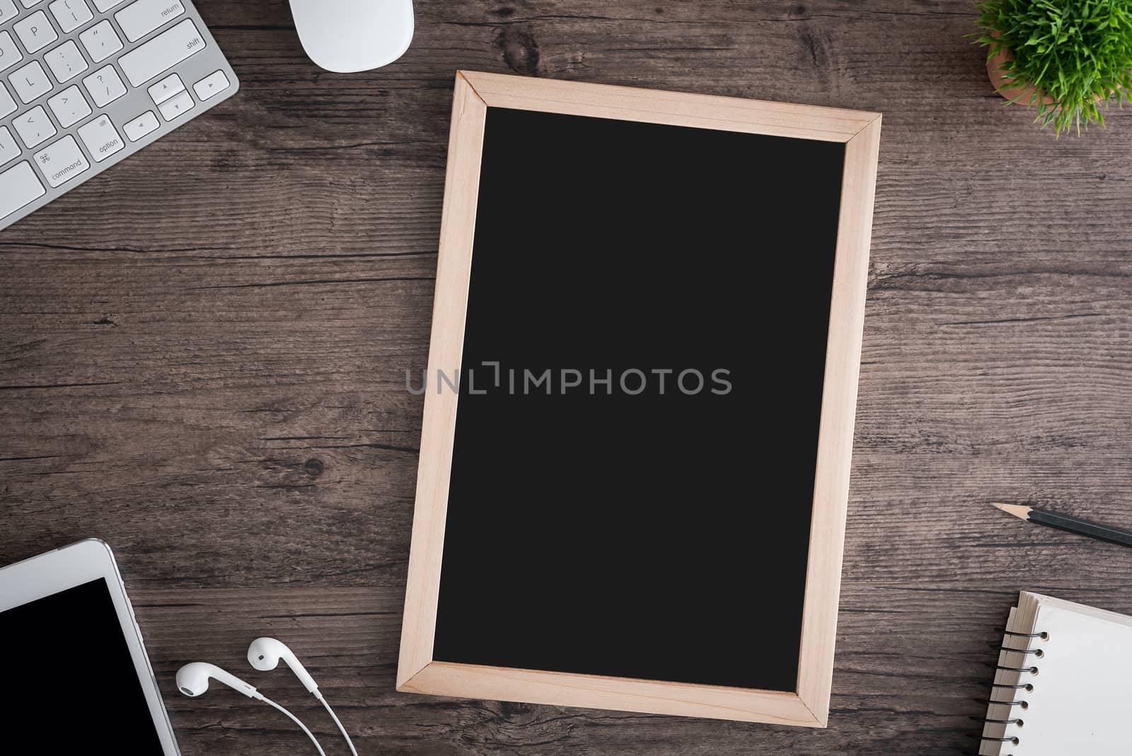 The office desk flat lay view with keyboard, mouse, tree, book,  by animagesdesign