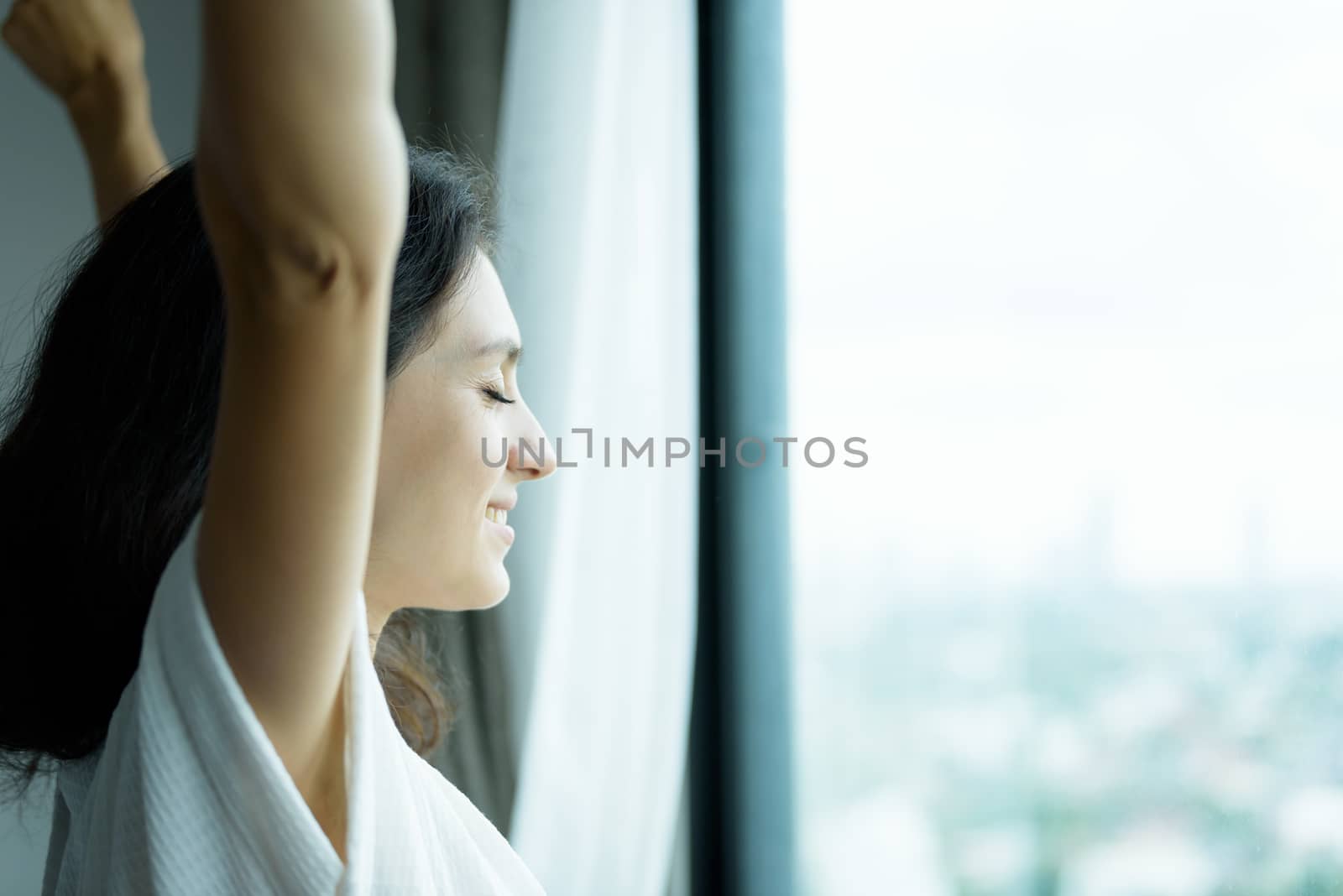 A beautiful woman wearing a towel and a white bathrobe with happ by animagesdesign