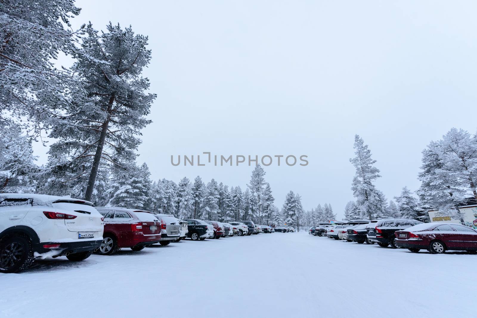 Editorial: Kuusamon City, Finland, 27th December 2018. Car park at Holiday Club Kuusamon Tropiikki with heavy snow in winter season at Kuusamon, Finland.