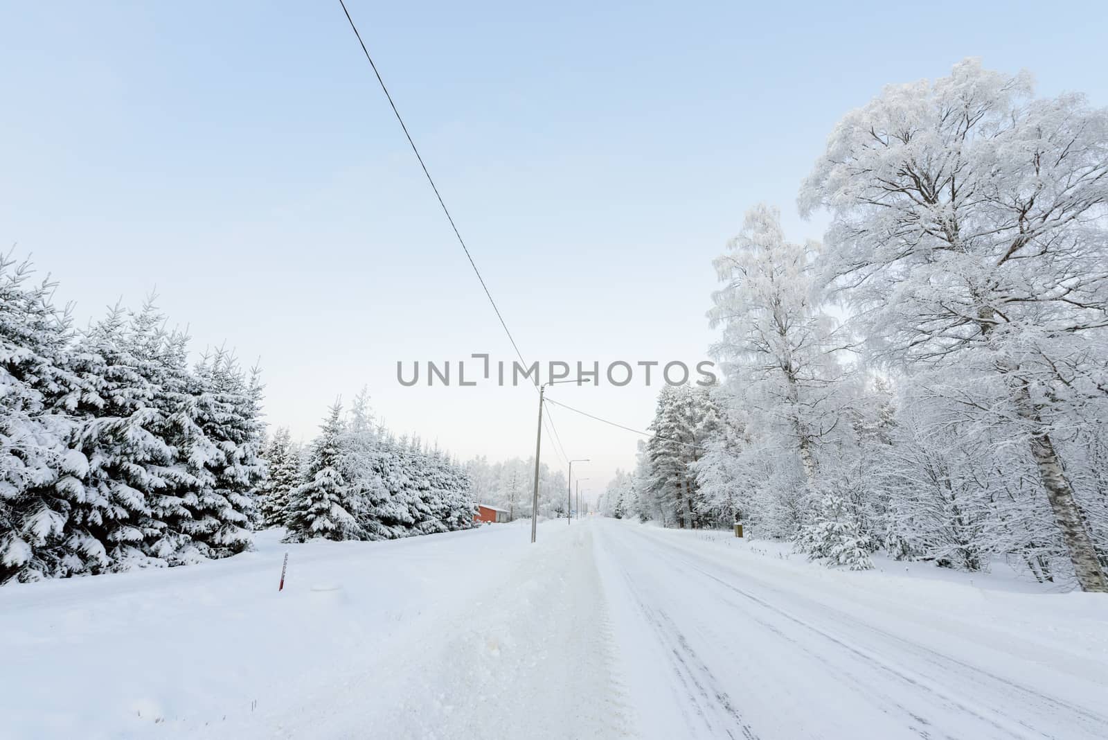 The road number 496  has covered with heavy snow in winter seaso by animagesdesign