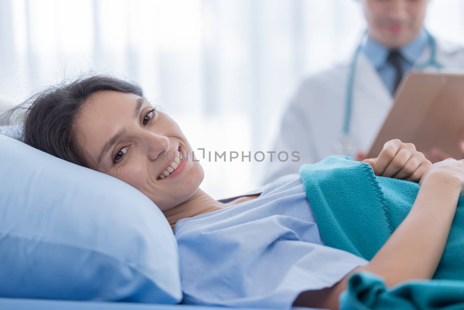 The patient woman has smiling and happy in the hospital. by animagesdesign