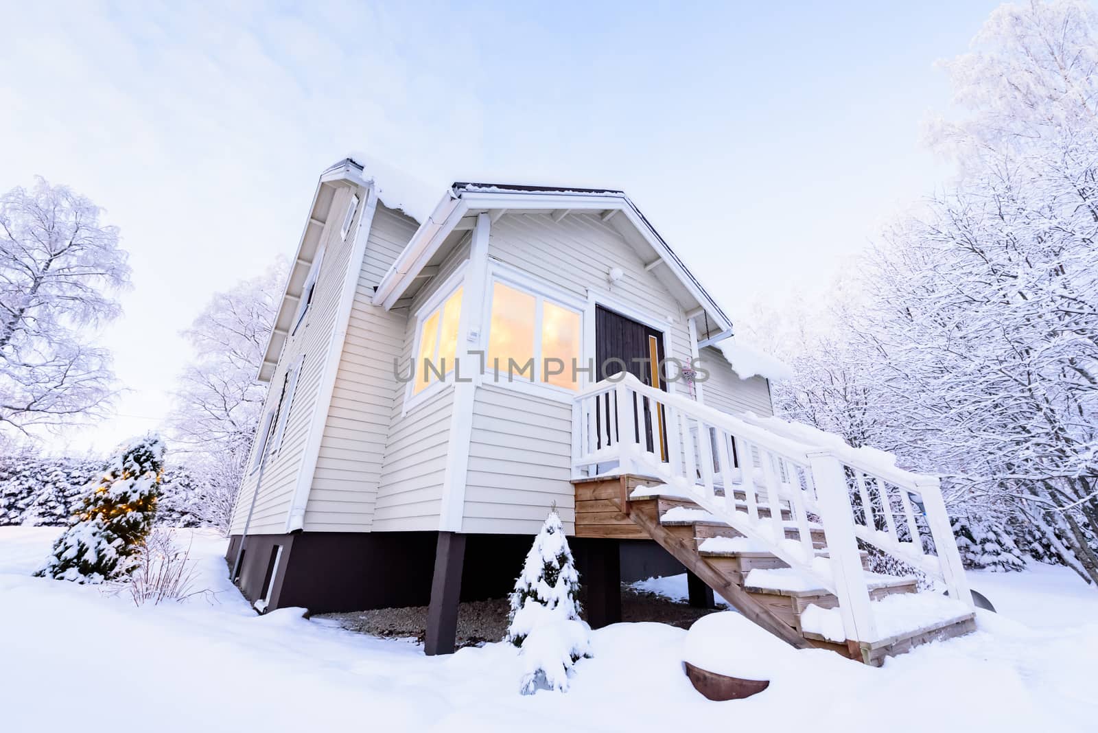 The house in the forest has covered with heavy snow in winter se by animagesdesign